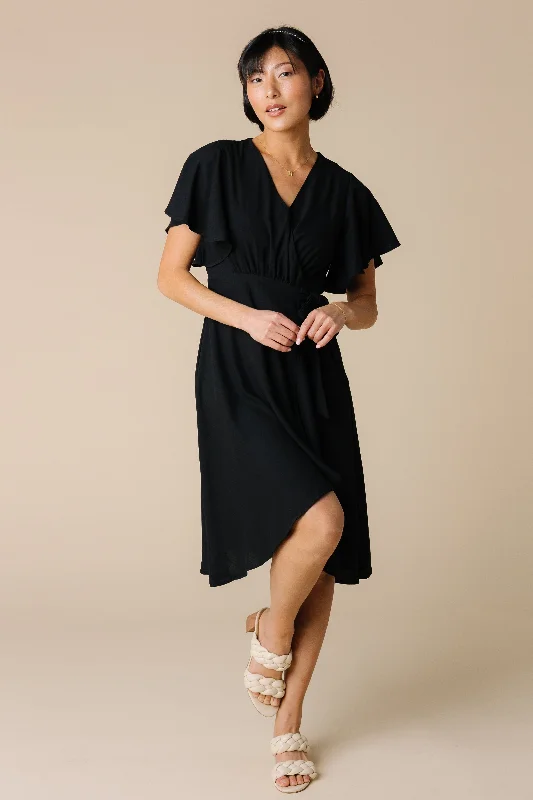 Plus size dresses featuring boho vibes are chic -Sandals for women with swollen feet -Plus size dresses for dressy casual wear -Daphne Tulip Wrap Dress - Black