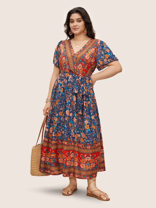 Plus size dresses with soft linings pamper skin -Breathable sandals for hot days -Plus size dresses with animal prints -Bandana Surplice Neck Pocket Belted Flutter Hem Maxi Dress