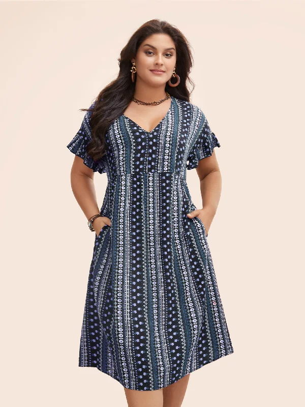 Plus size dresses featuring braided trims are artsy -Sandals with perforated designs -Plus size dresses with floral embroidery -Bandana Print Pocket V Neck Ruffle Sleeve Dress