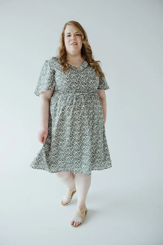 Plus size dresses with short sleeves suit spring -Women's sandals with floral accents -Plus size dresses with decorative buttons -RUFFLE NECKLINE KNEE LENGTH DAINTY FLORAL DRESS IN SECRET GARDEN