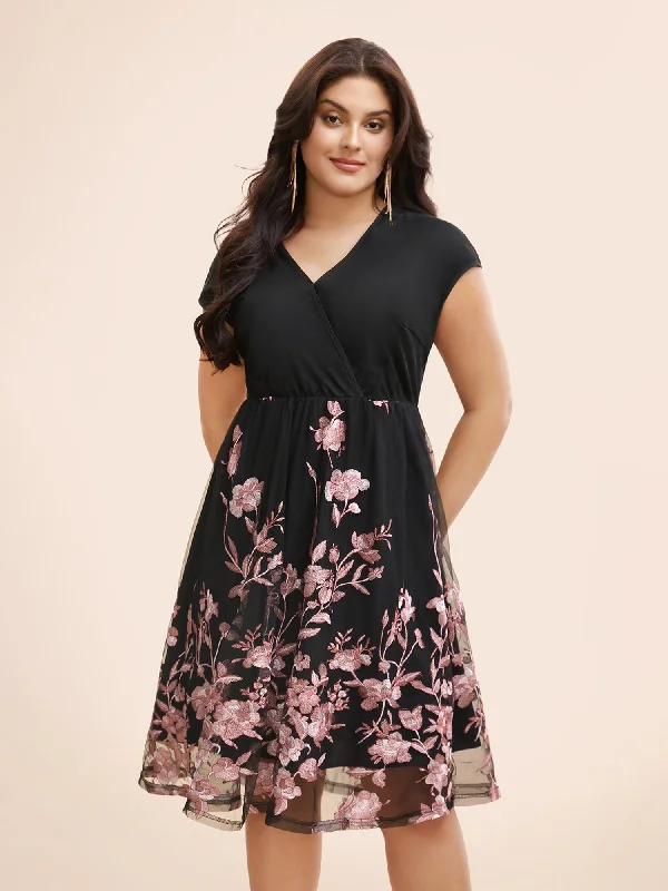 Plus size dresses with cap sleeves feel dainty -Sandals with adjustable straps for comfort -Plus size dresses with asymmetrical hemline -Floral Embroidered Wrap Cap Sleeve Dress