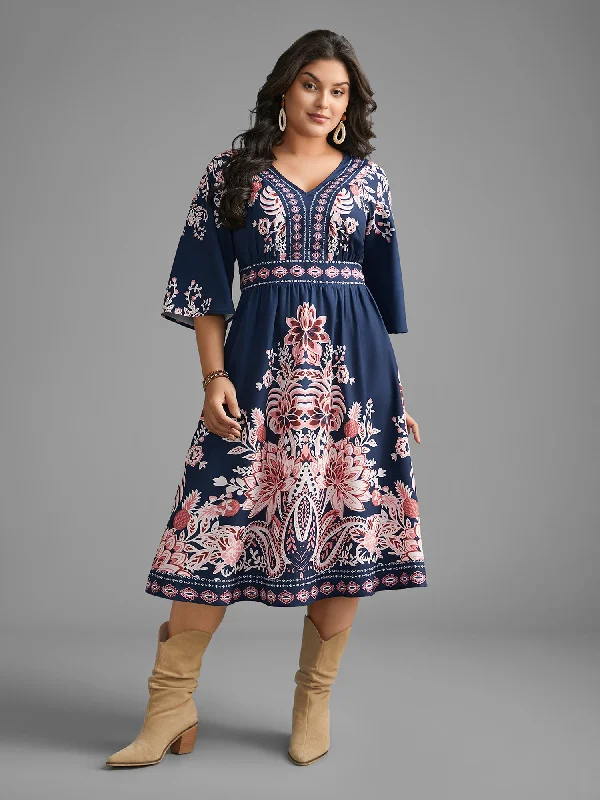 Chic plus size dresses for evenings drape perfectly -Stylish sandals for casual outings -Plus size dresses for outdoor events -Boho Print Ruffle Sleeve Shirred Dress