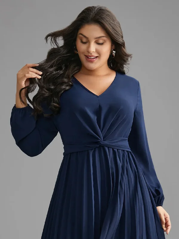 Plus size dresses with lightweight knits feel breezy -Colorful sandals for summer fun -Plus size dresses for sophisticated look -V Neck Twist Front Pleated Dress