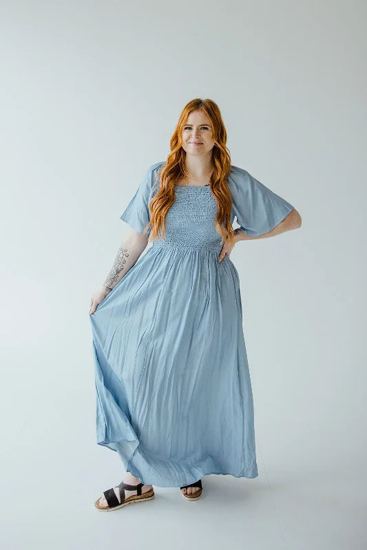 Plus size dresses in soft fabrics feel cozy -Breathable sandals for hot days -Plus size dresses with animal prints -SOLID SMOCKED BODICE DRESS IN FADED DENIM SHEEN