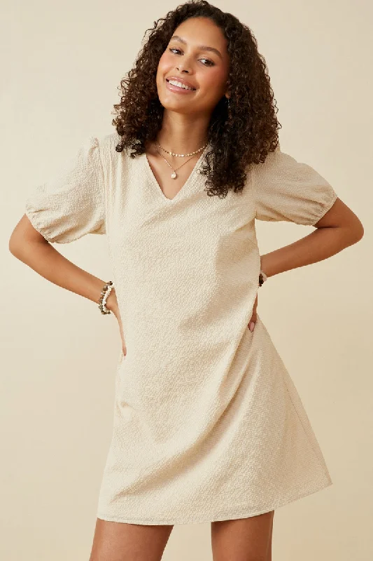 Plus size dresses featuring neutral tones pair easily -Sandals with rhinestones or embellishments -Plus size dresses for graduation -Seersucker Textured V Neck Puff Sleeve Dress